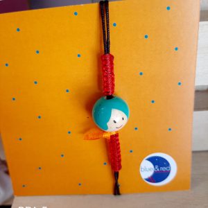 Βραχιόλι με ξύλινη φιγούρα και κούμπωμα με κόμπο αυξομείωσης